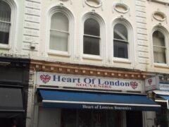 London souvenir-shop storefront, illustrating HMRC's 2026 high-street enforcement checks involving disposable vapes