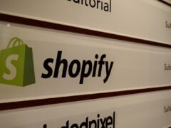 Shopify office signage, illustrating a reported 2026 platform ban on vape sales