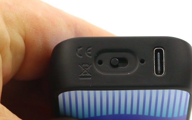 Close-up of a USB-C charging port on the bottom of a vape device