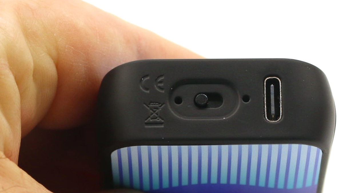 Close-up of a USB-C charging port on the bottom of a vape device